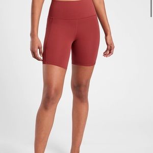 Athleta Canyon Red Salutation Stash Pocket 7” Short